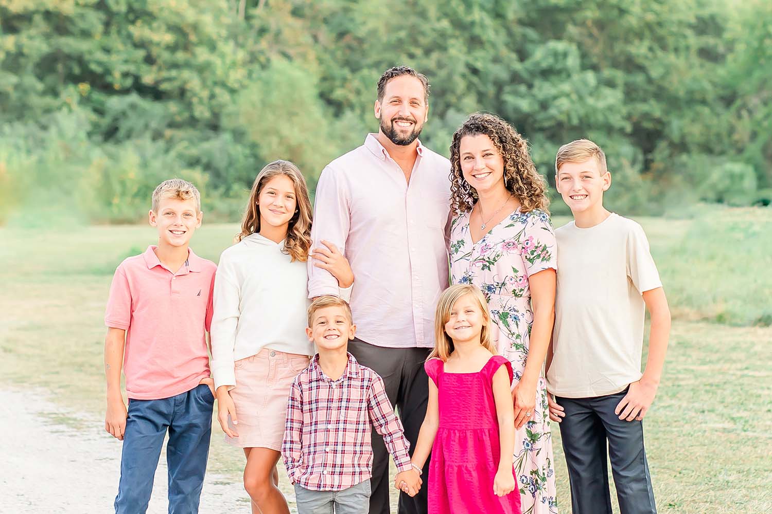 Picture of Amanda Smith (RN), a Marquette Method Instructor in Tennessee, with her family in a field